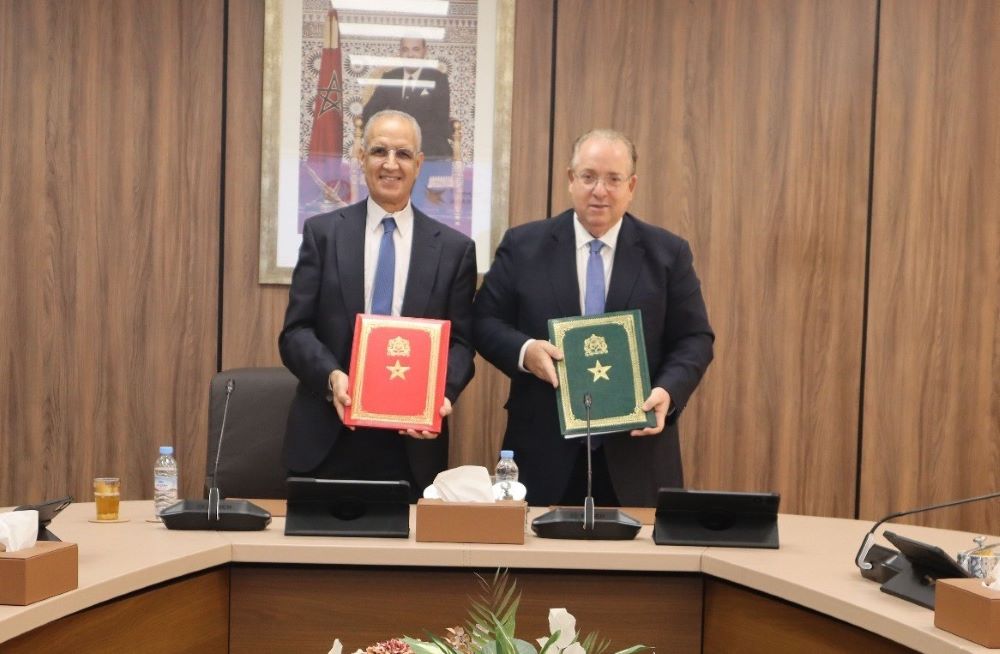 اتفاقية شراكة بين البريد بنك وهيئة أطباء الأسنان